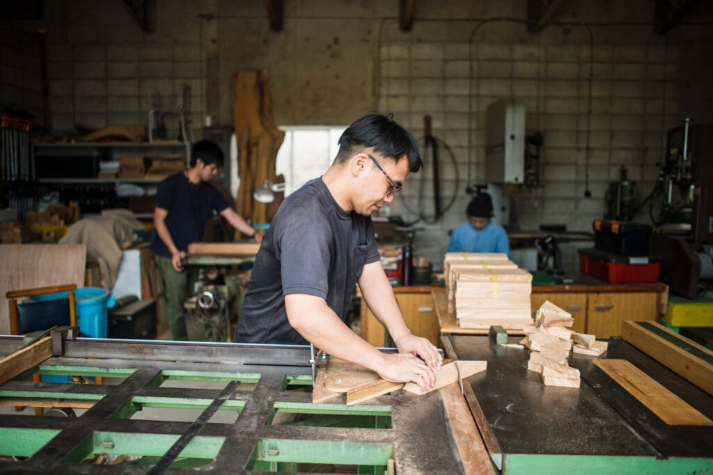 What Are Merchant Services? A Small Business Owner’s Guide to Getting Paid 1 Craftsman working in a woodworking shop, an example of a small business that relies on merchant services to accept customer payments